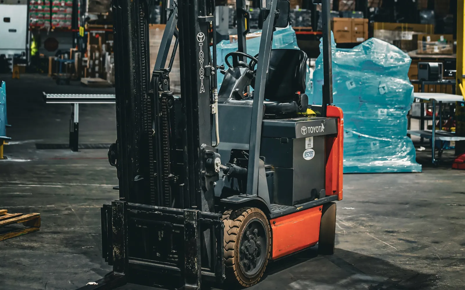 Used Toyota electric counterbalanced forklift in a warehouse, for sale in Baltimore, MD