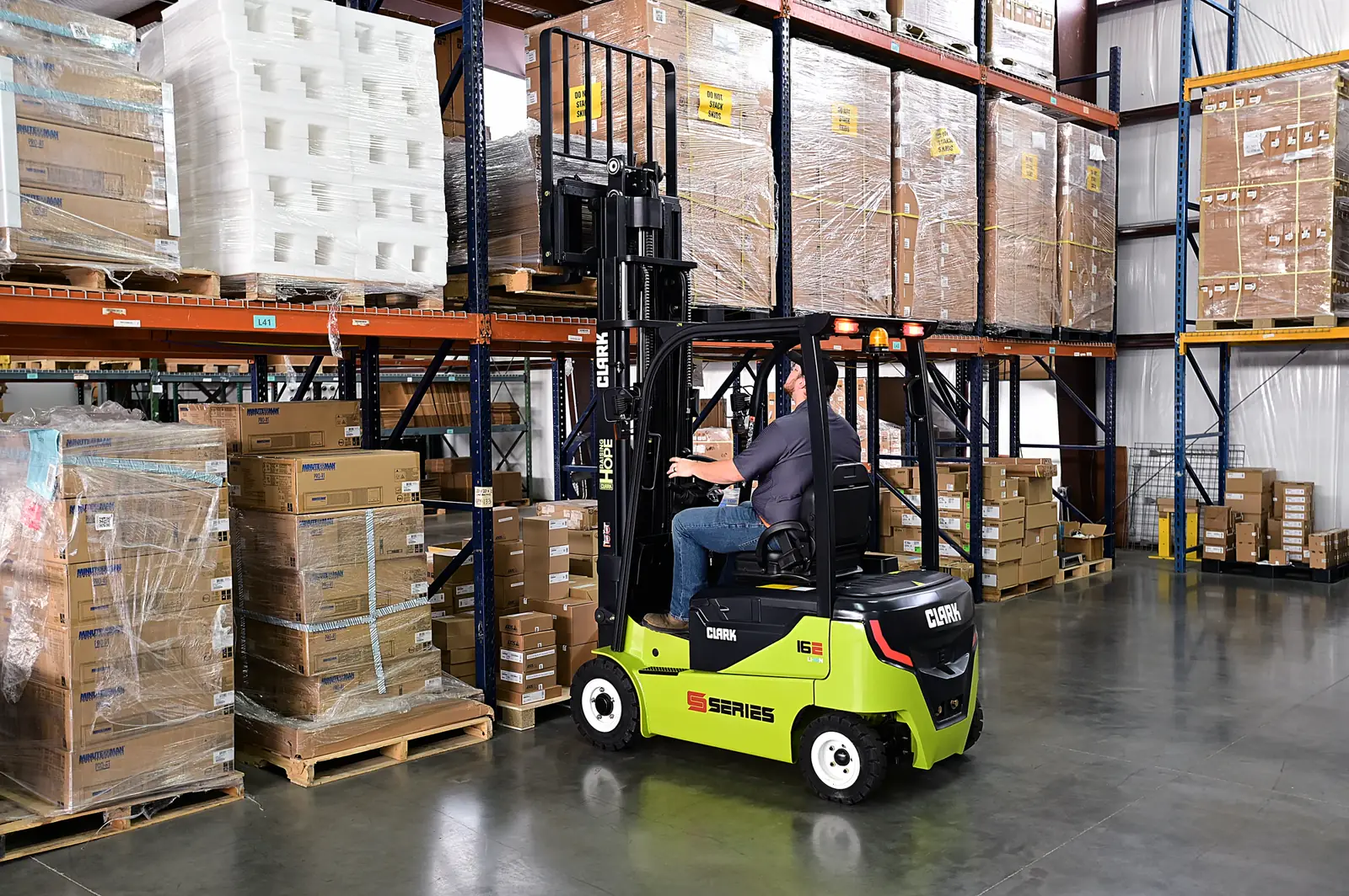 Forklift working in front of pallet racking at a warehouse in Jessup, MD